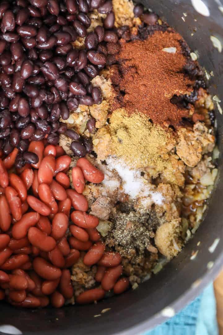 All of the chili ingredients in the dutch oven
