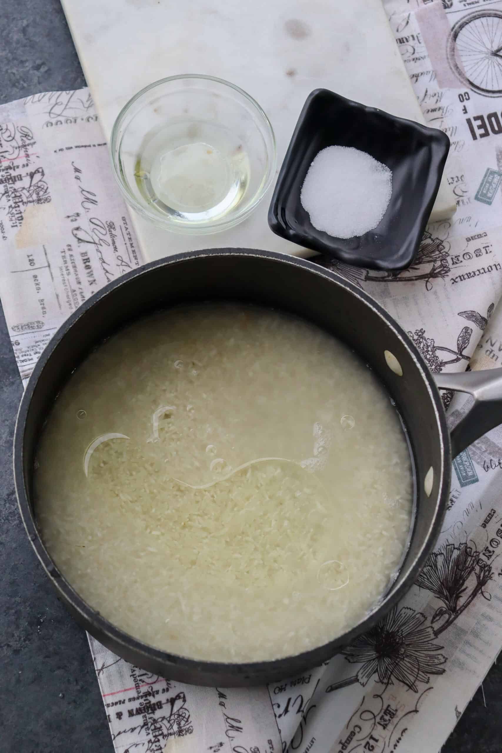 rice water and oil in a sauce pan